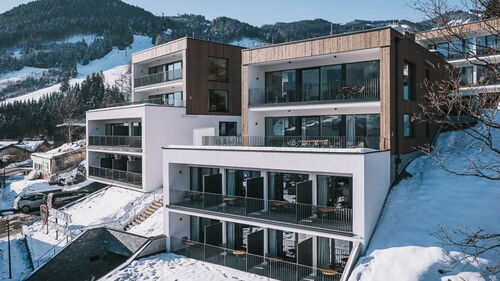 Hotel Nikolaus by AvenidA in Zell am See in winter
